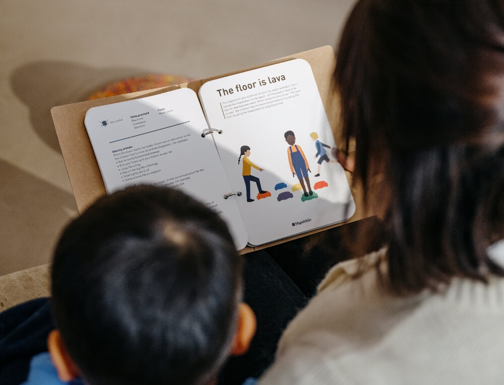 Mother and child reading Stapelstein Balancing Stepping Stones Game Ideas, Australia