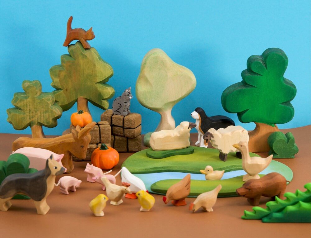 Farmyard and Domestic Animals small world scene with handcrafted wooden animal figurines at Oskar's Wooden Ark in Australia