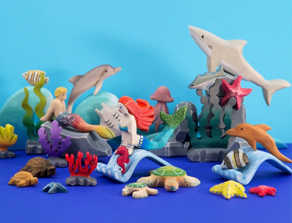 Sea Creatures small world scene with handcrafted wooden fish, dolphins and mermaid figurines at Oskar's Wooden Ark in Australia