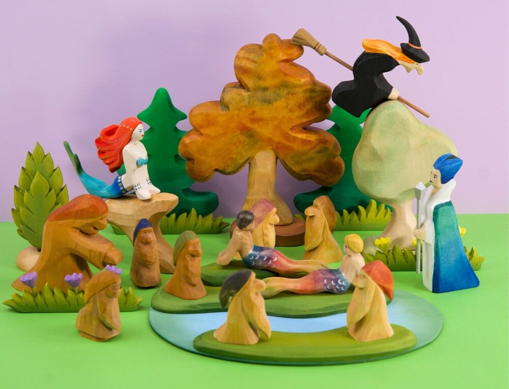 Magical children's small world scene with wooden friends and people figurines at Oskar's Wooden Ark in Australia