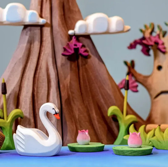 BumbuToys Small World Scene of White Swan on Lake with Volcano and Spooky Tree with Hanging Bats in the Background