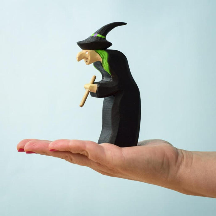 BumbuToys Wooden Brewing Witch Halloween Figure in Adult's Hand for Size Comparison