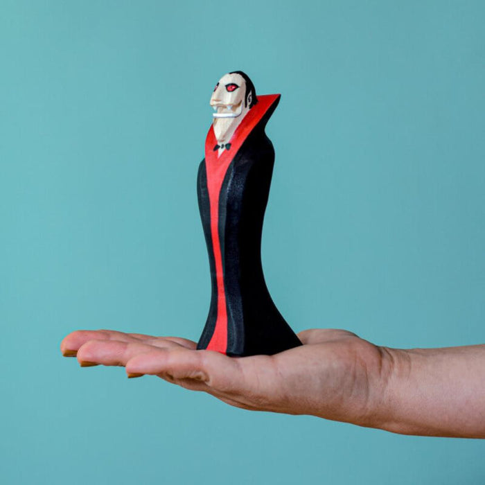 BumbuToys Wooden Dracula the Vampire Figurine in Adult's Hand for Size Comparison