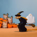 BumbuToys Wooden White Ghost Figurine Sitting on Witch's Broom with Halloween Witch in Small World Play Scene