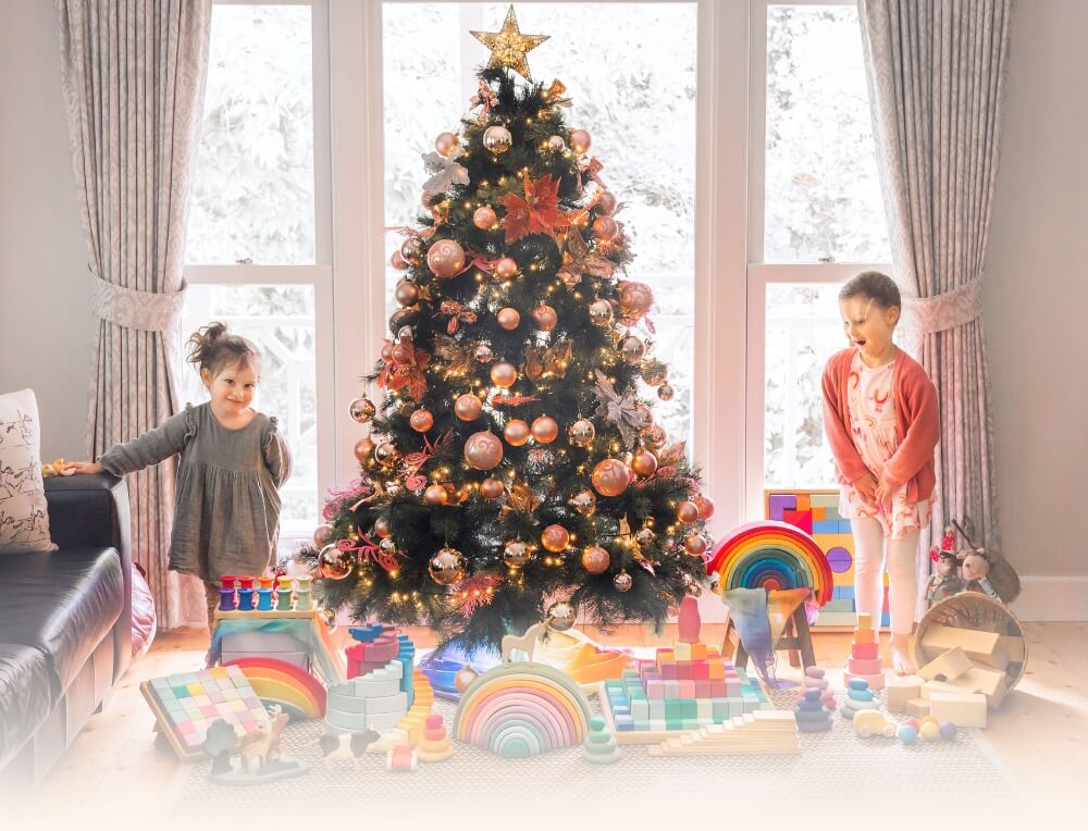 Children delighted with Grimm's Wooden Toys Christmas Gifts from Oskar's Wooden Ark in Australia under the Christmas tree