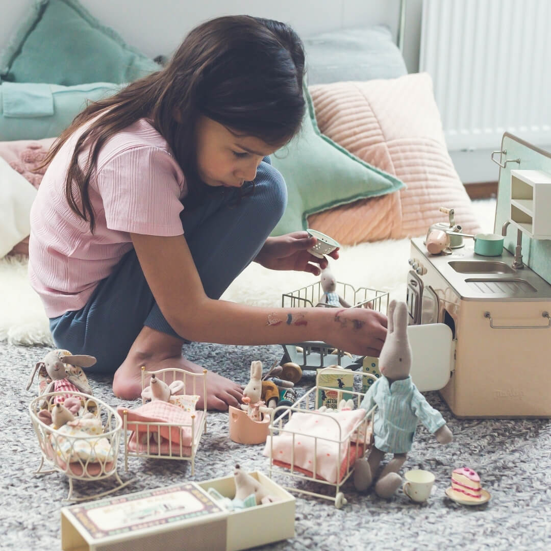 Child creating a magical imaginary world with Maileg mice, bunnies, furniture and accessories at Oskar's Wooden Ark in Australia