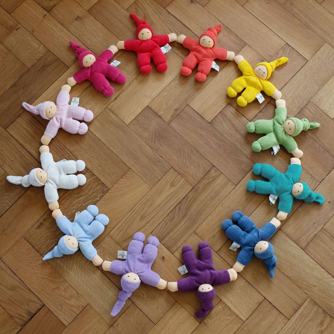 Nanchen Pimpel Waldorf Baby Dolls in an assortment of rainbow colours, at Oskar's Wooden Ark in Australia