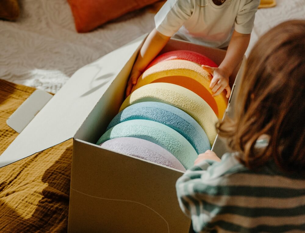 Unboxing new Stapelstein rainbow balancing and stepping stones at Oskar's Wooden Ark in Australia