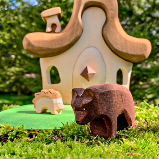 BumbuToys Handcrafted Wooden Animal Brown Bear Cub from Australia in a small-world play setting