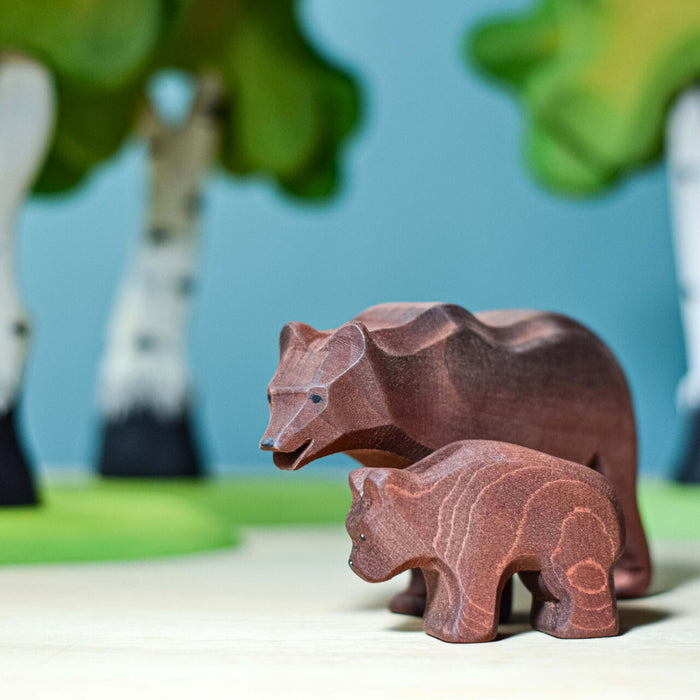 BumbuToys Handcrafted Wooden Animal Brown Bear Cub from Australia in a small-world play setting