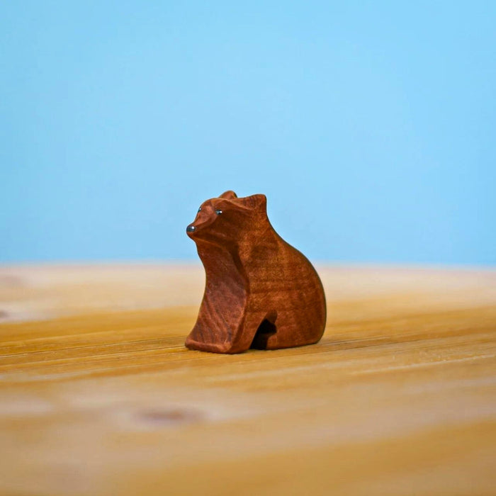 BumbuToys Handcrafted Wooden Animal Sitting Brown Bear Cub for Small World Play from Australia