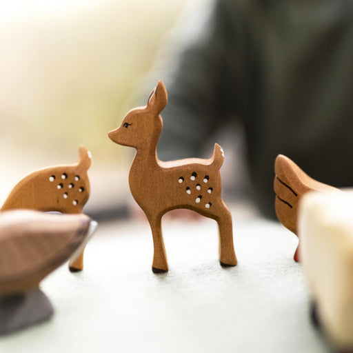 BumbuToys Handcrafted Wooden Animal Deer Fawn Standing from Australia in a small-world play setting