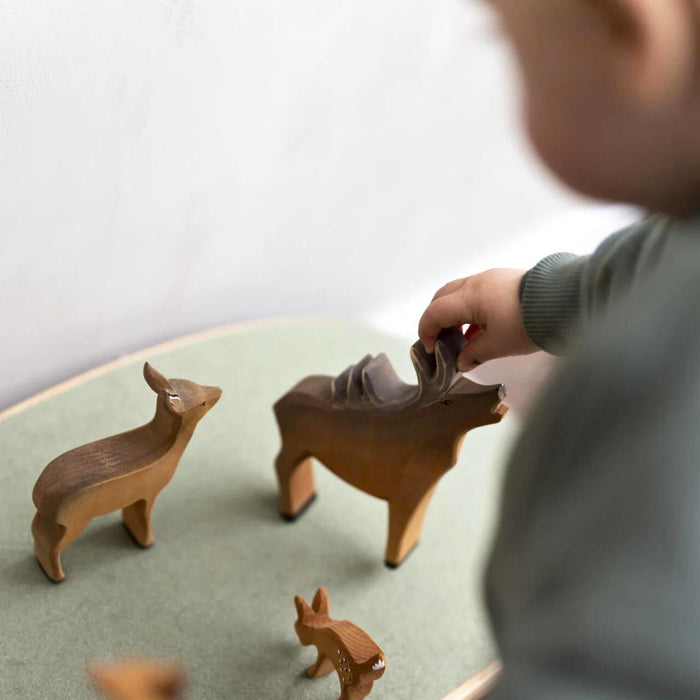 BumbuToys Handcrafted Wooden Animal Deer Stag from Australia in a small-world play setting