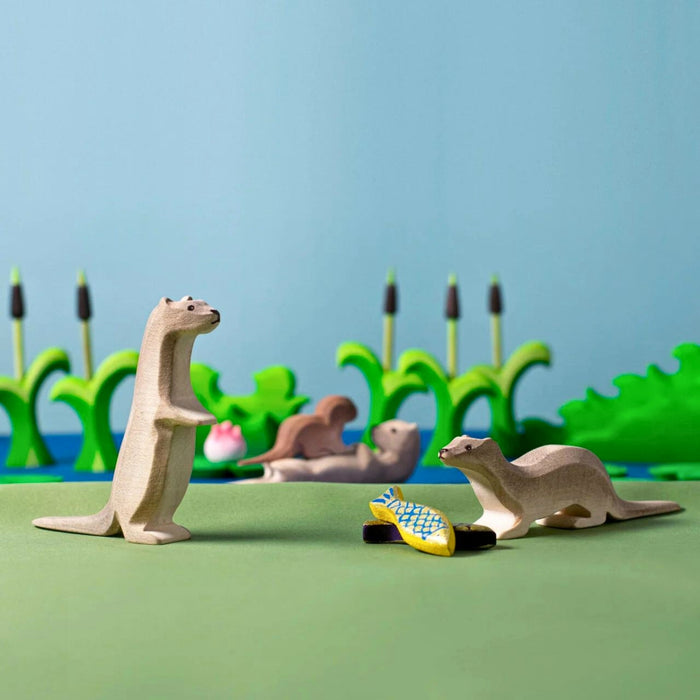 BumbuToys Handcrafted Wooden Animal Otter from Australia in a small-world play setting