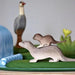 BumbuToys Handcrafted Wooden Animal Otter from Australia in a small-world play setting