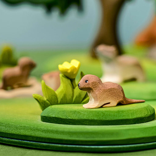 BumbuToys Handcrafted Wooden Animal Baby Otter from Australia in a small-world play setting