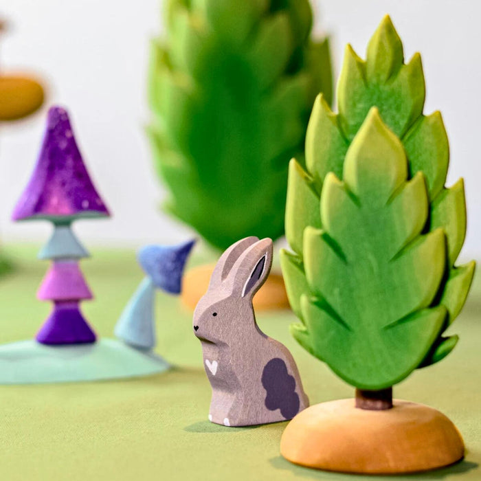 BumbuToys Handcrafted Wooden Animal Sitting Grey Rabbit from Australia in a small-world play setting