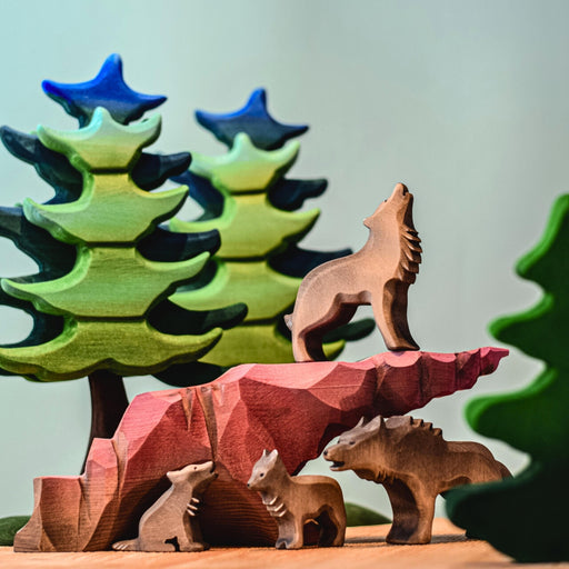BumbuToys Handcrafted Wooden Animal Wolf Pack from Australia in a small-world play setting