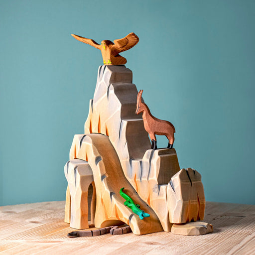 BumbuToys Handcrafted Wooden Landscape Mountain Cliff from Australia in a small-world play setting