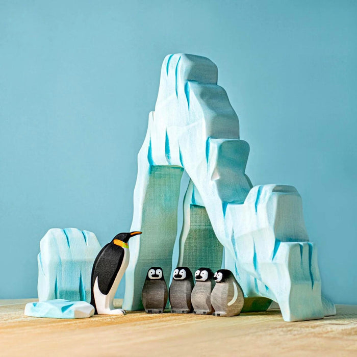 BumbuToys Handcrafted Wooden Bird Emperor Penguin Family from Australia in a small-world play setting
