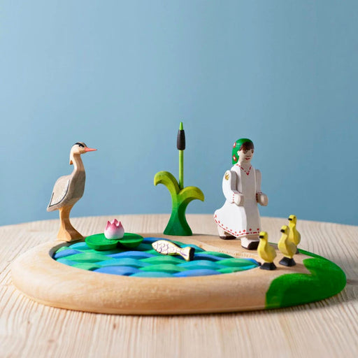 BumbuToys Handcrafted Wooden Bird Grey Heron from Australia in a small-world play setting