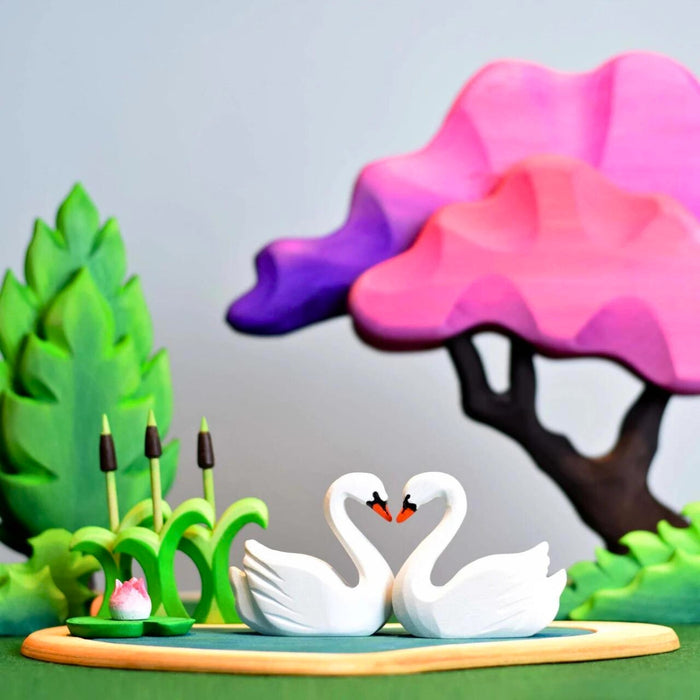 BumbuToys Handcrafted Wooden Bird Swans from Australia in a small-world play setting