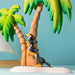 BumbuToys Handcrafted Wooden Bird Toucan Standing from Australia in a small-world play setting