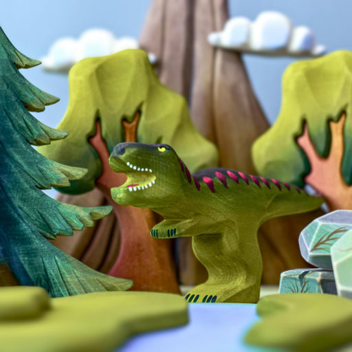 BumbuToys Handcrafted Wooden Dinosaur T Rex from Australia in a small-world play setting