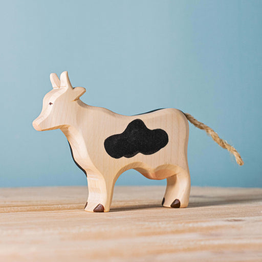 BumbuToys Handcrafted Wooden Farm Animal Cow with Black Spots from Australia