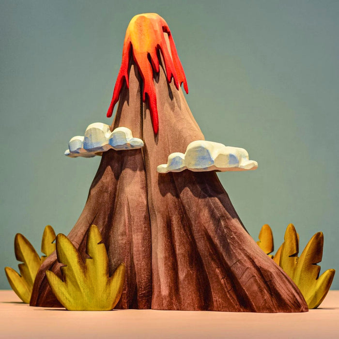 BumbuToys Handcrafted Wooden Figure Landscape Volcano, Lava, and Clouds Set of 5 from Australia in a small-world play setting