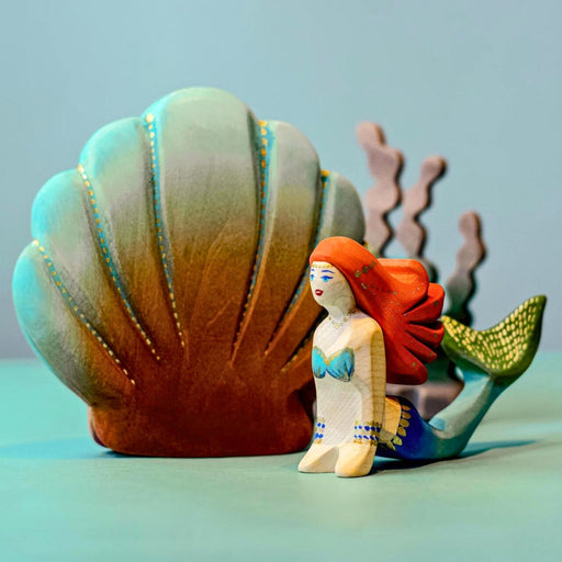 BumbuToys Handcrafted Wooden Mermaid and Shell Set from Australia in a small-world play setting