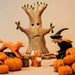 BumbuToys Handcrafted Wooden Witch Figure from Australia in a small-world play setting