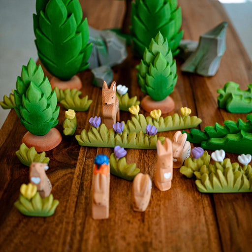 BumbuToys Handcrafted Wooden Plant Figure Large Grass with Yellow Flowers from Australia in a small-world play setting