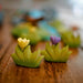 BumbuToys Handcrafted Wooden Plant Figure Small Grass with Yellow Flowers  from Australia in a small-world play setting