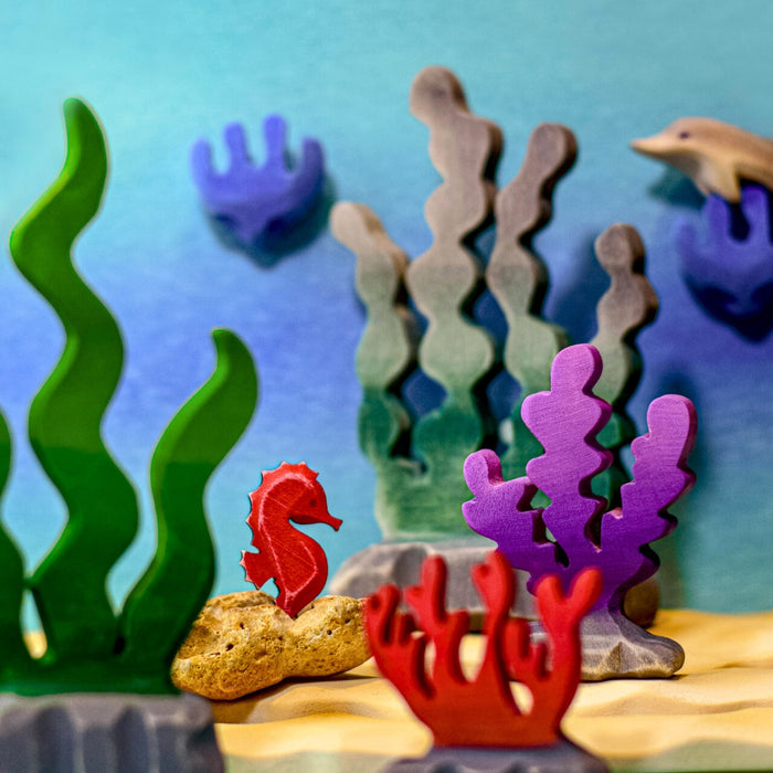 BumbuToys Handcrafted Wooden Sea Creature Figure Purple Seaweed from Australia in a small-world play setting