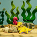 BumbuToys Handcrafted Wooden Starfish Set in Yellow from Australia in a small-world play setting