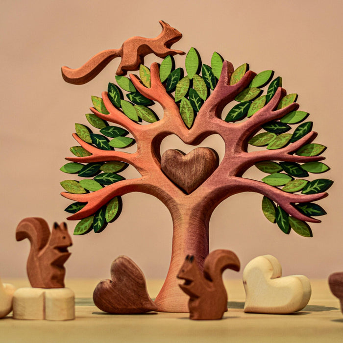 BumbuToys Handcrafted Wooden Heart Tree from Australia in a small-world play setting