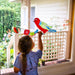 Child drawing on a window using Kitpas removeable rice bran wax crayons from Australia