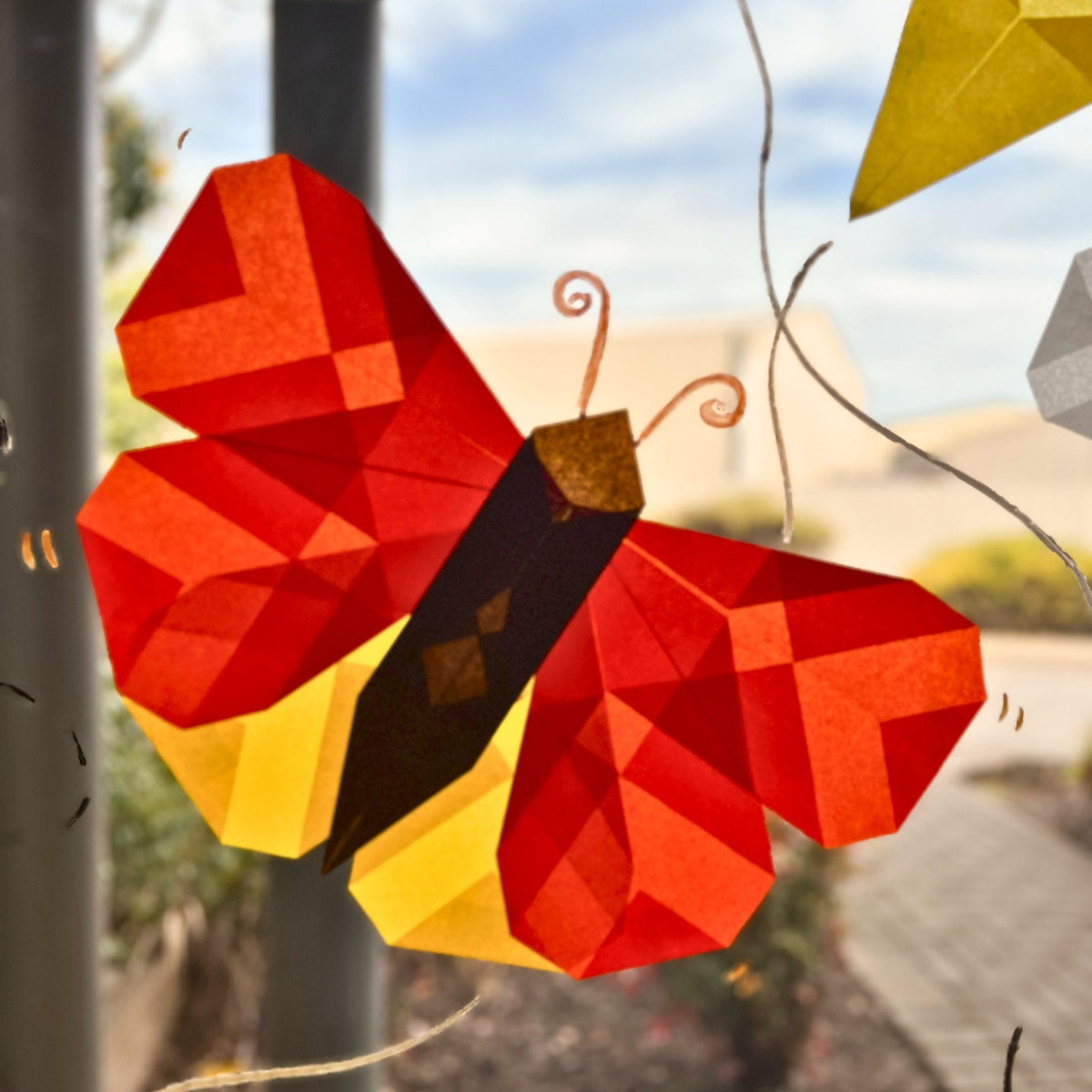 Yellow and Red Flowers and Insects Folding Paper Window Art from Australia